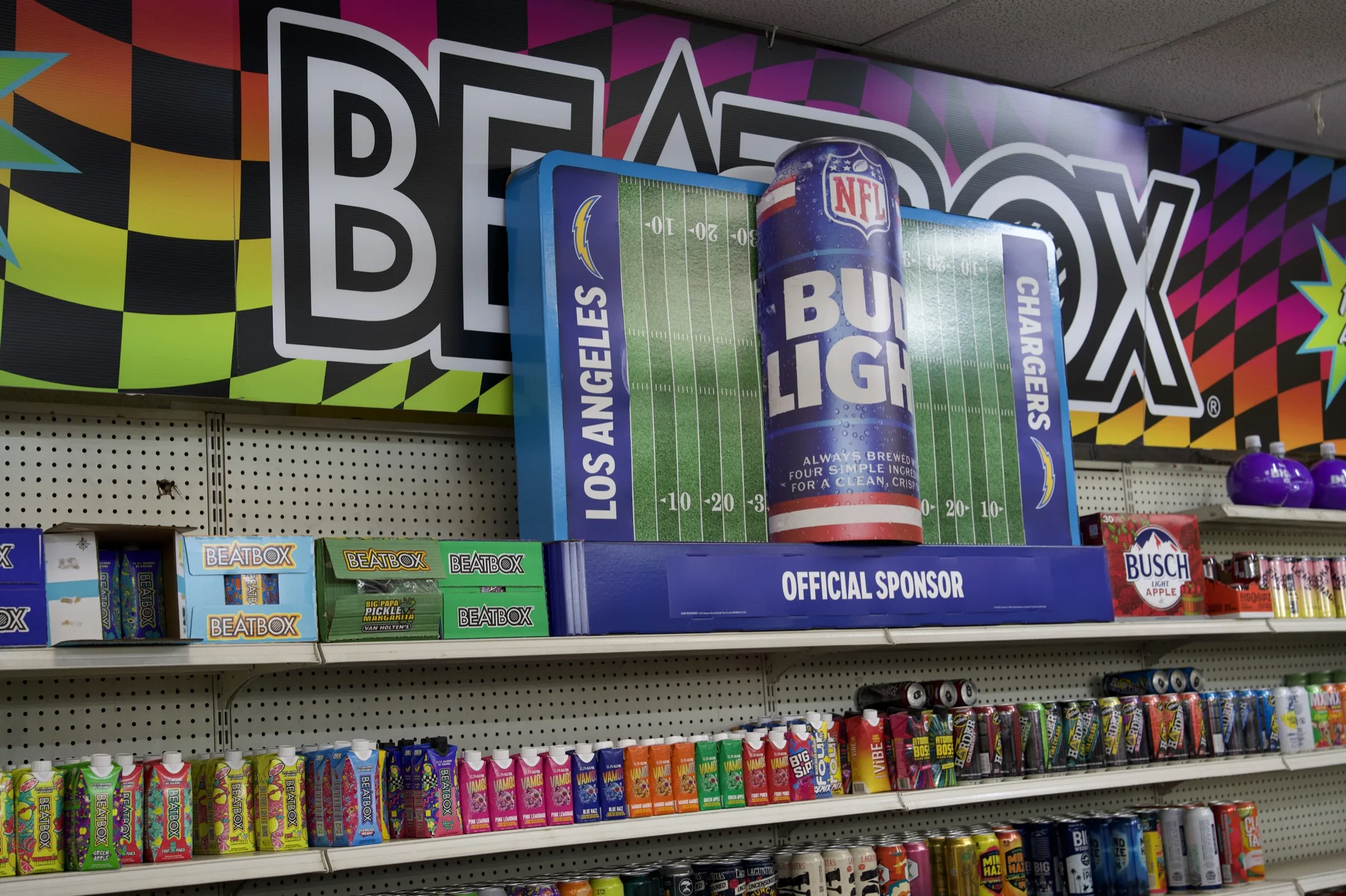 Cold domestic, imported, and craft beers on display inside Serv-Rite
