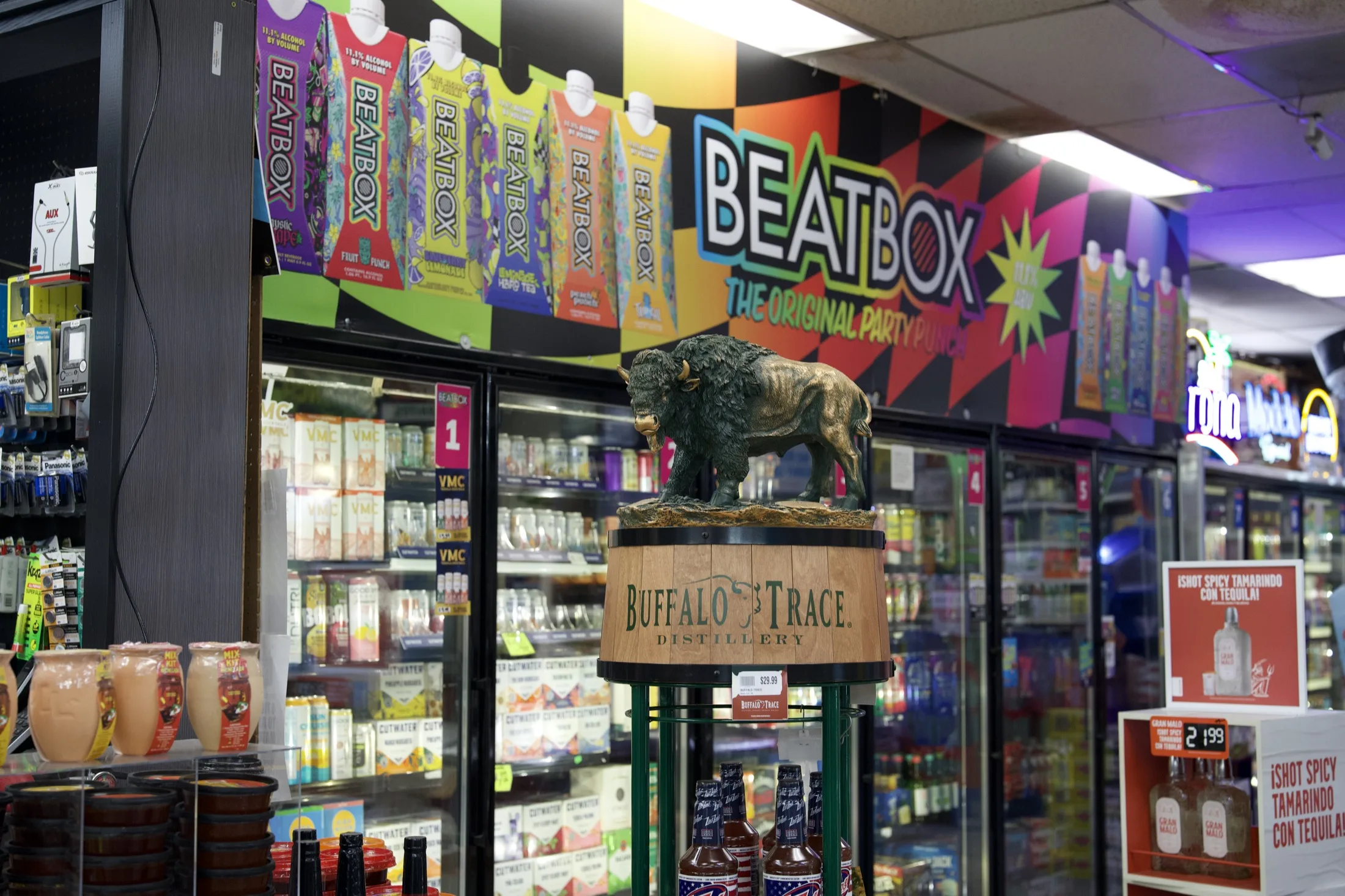 Cold beer cave cooler wall and Buffalo Trace bourbon barrel inside Serv-Rite